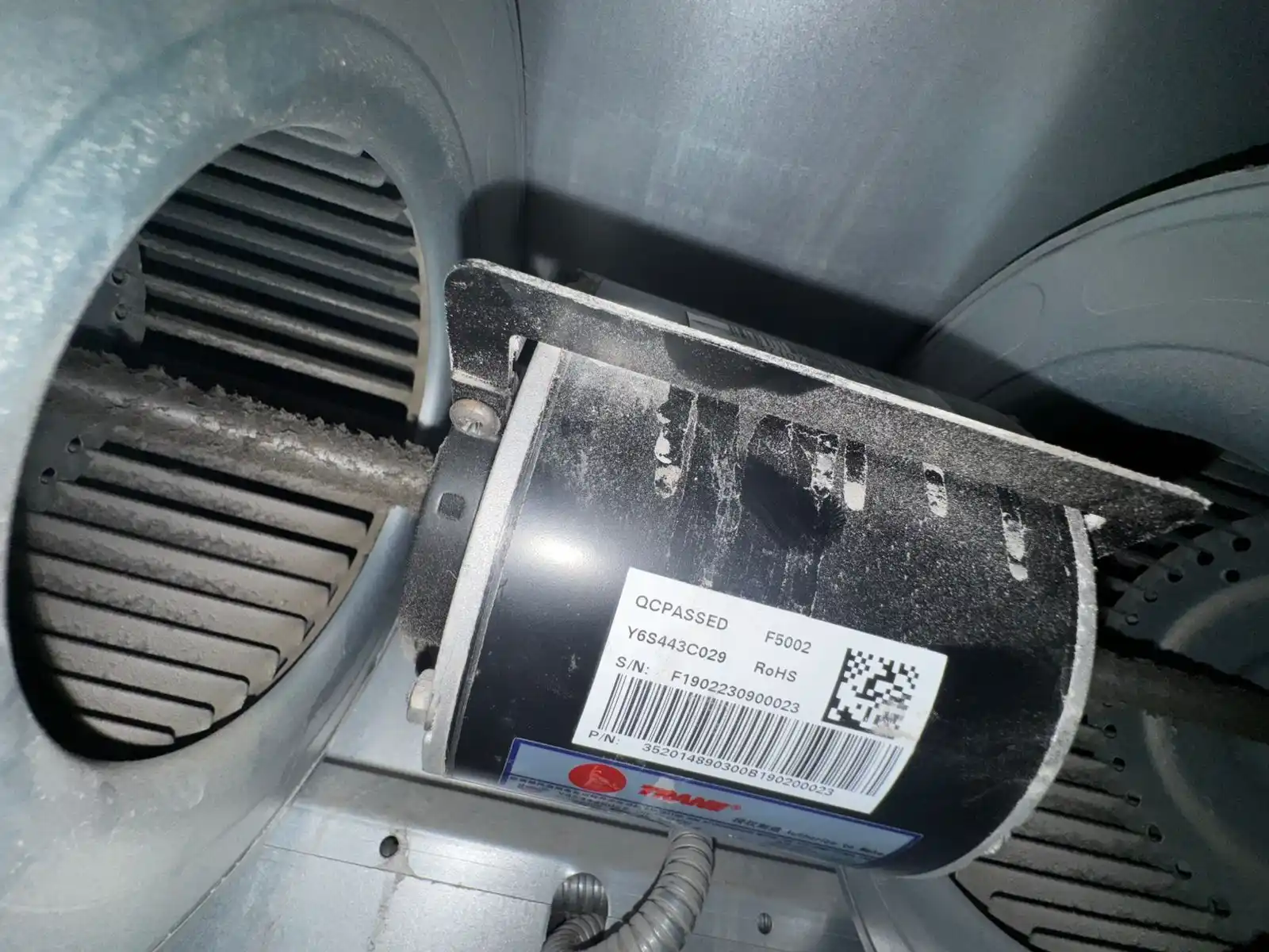 Technician checking an AC filter during maintenance in Dubai — supporting project view 3
