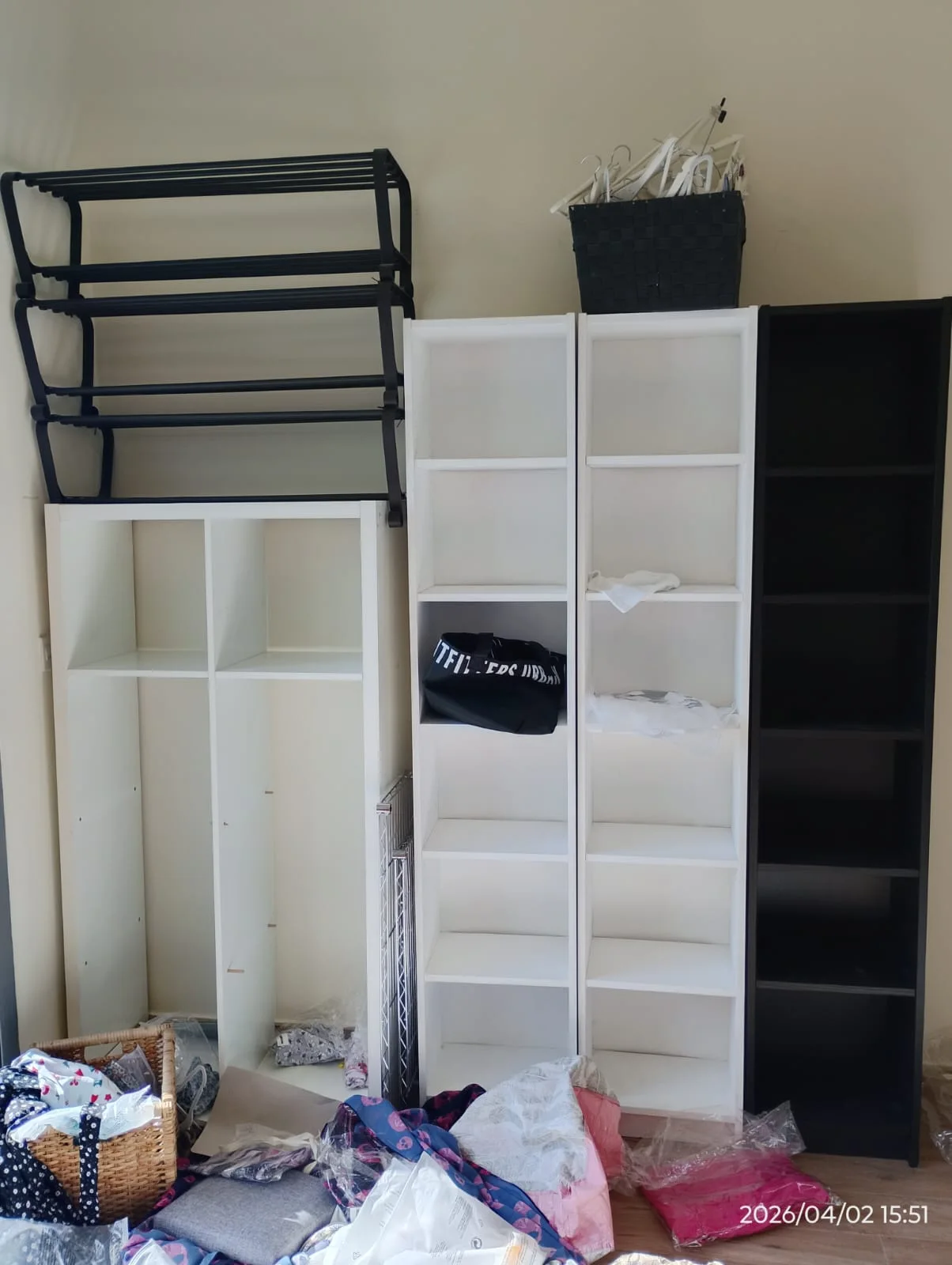 Technicians assembling a wardrobe inside a Dubai home — supporting project view 2