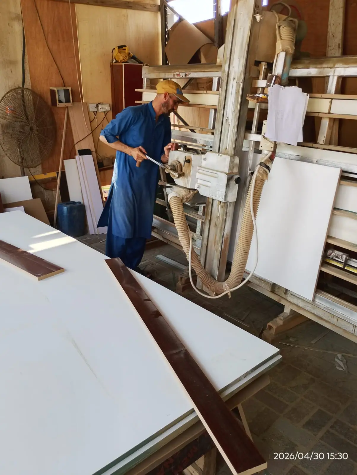 Carpenter preparing wooden panels for custom woodwork in Dubai — supporting project view 1