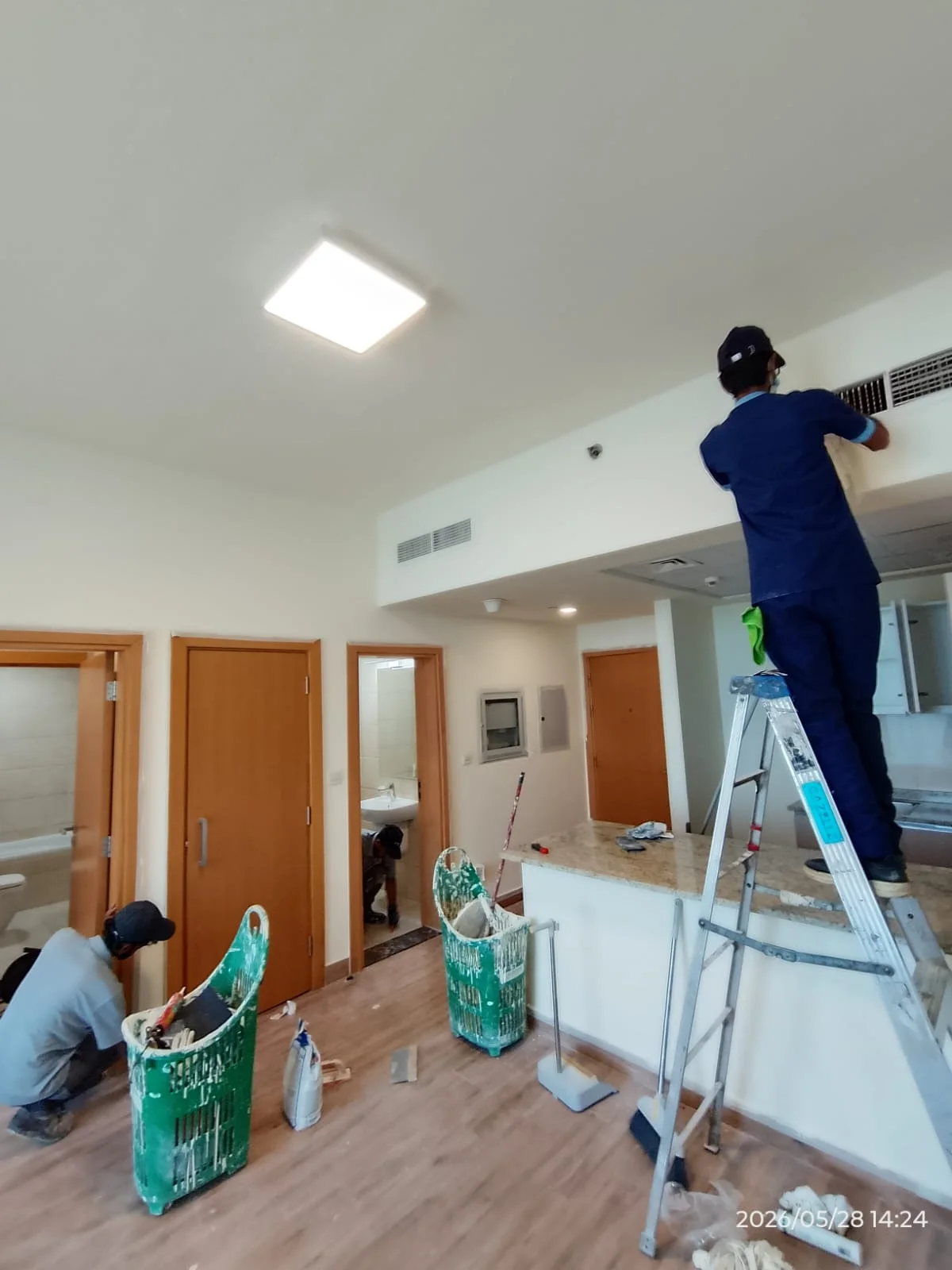 Cleaning team carrying out deep cleaning inside a Dubai home