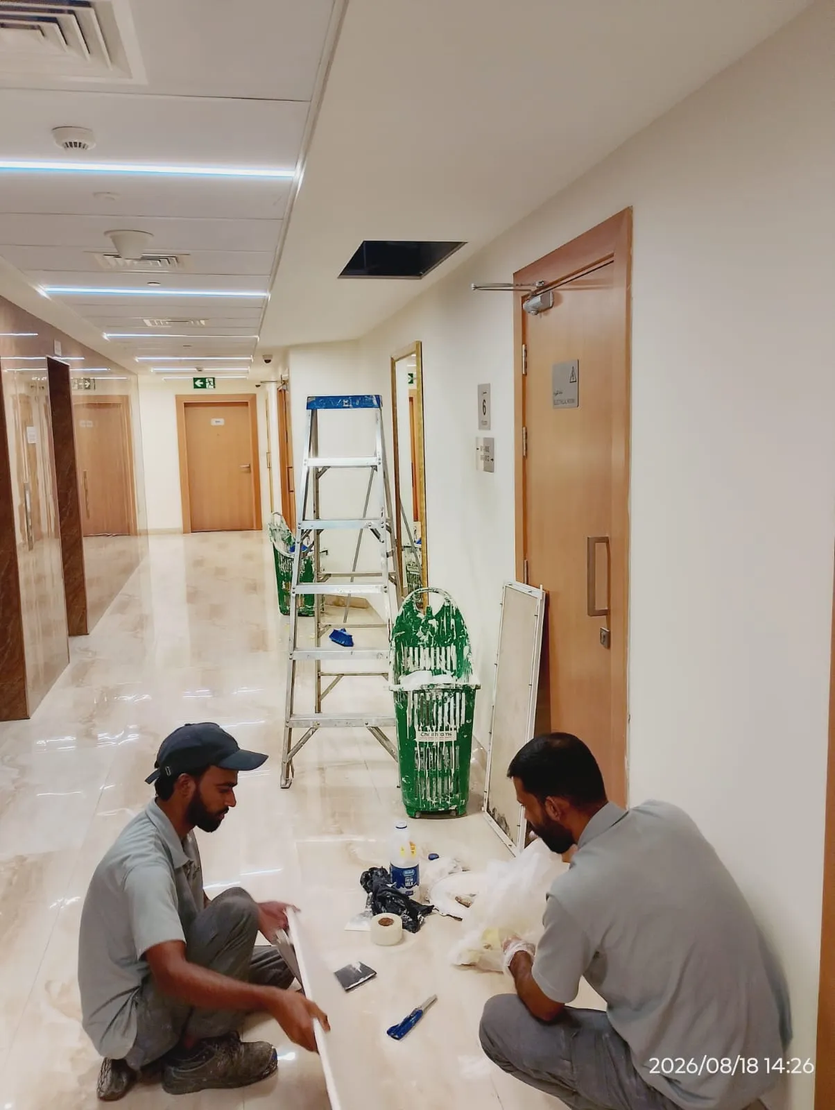 Technician carrying out an urgent wall repair in a Dubai property — supporting project view 1