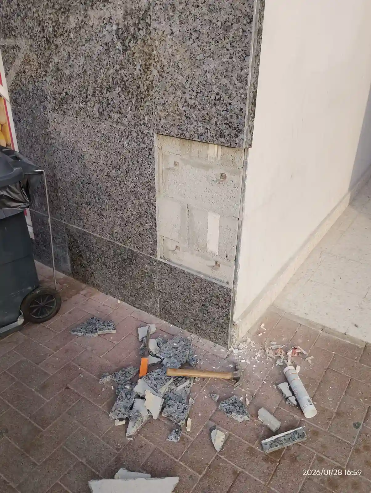 Technician repairing floor tiles in a Dubai property — supporting project view 1