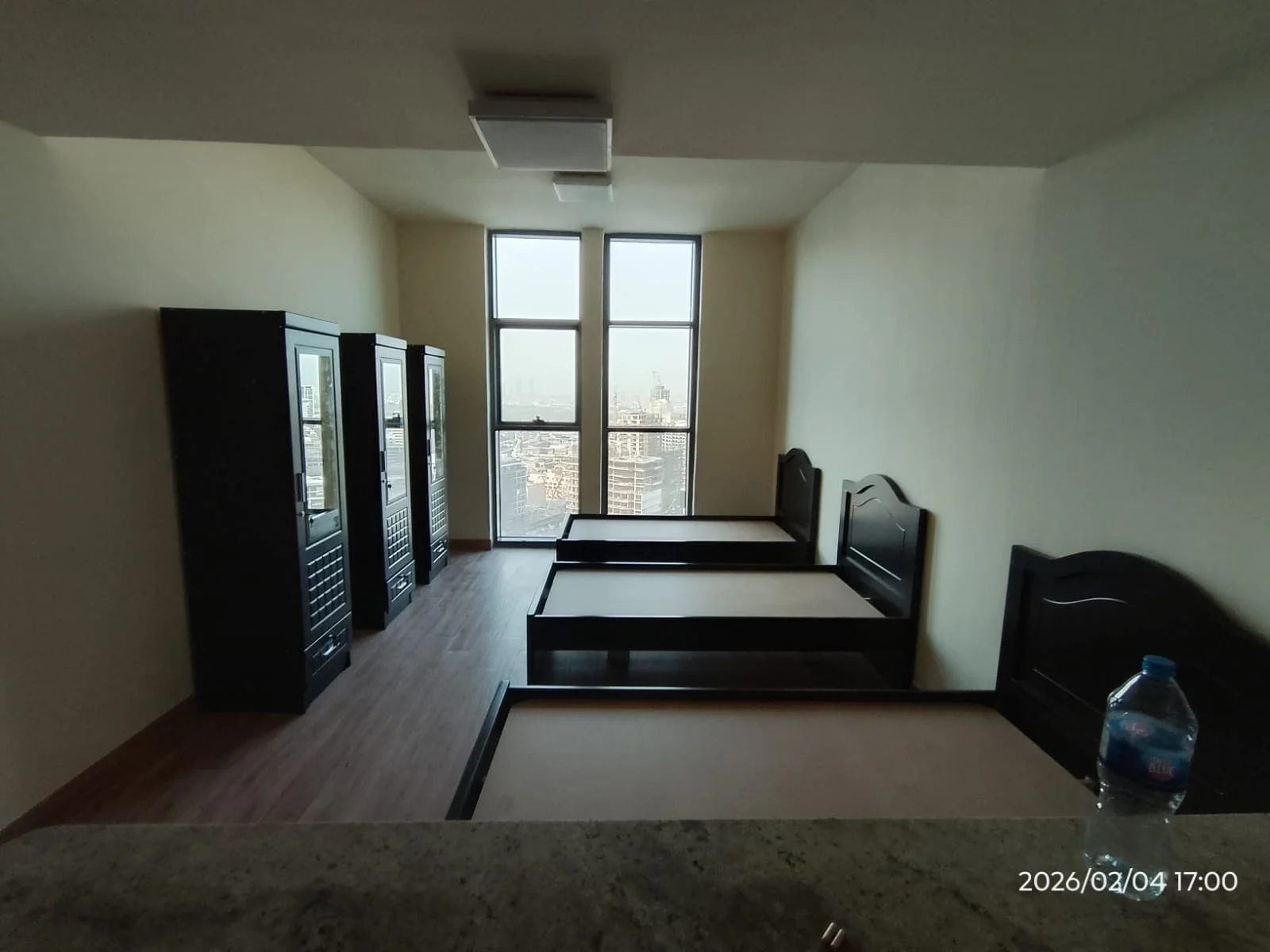 Technicians assembling furniture inside a Dubai home — supporting project view 1