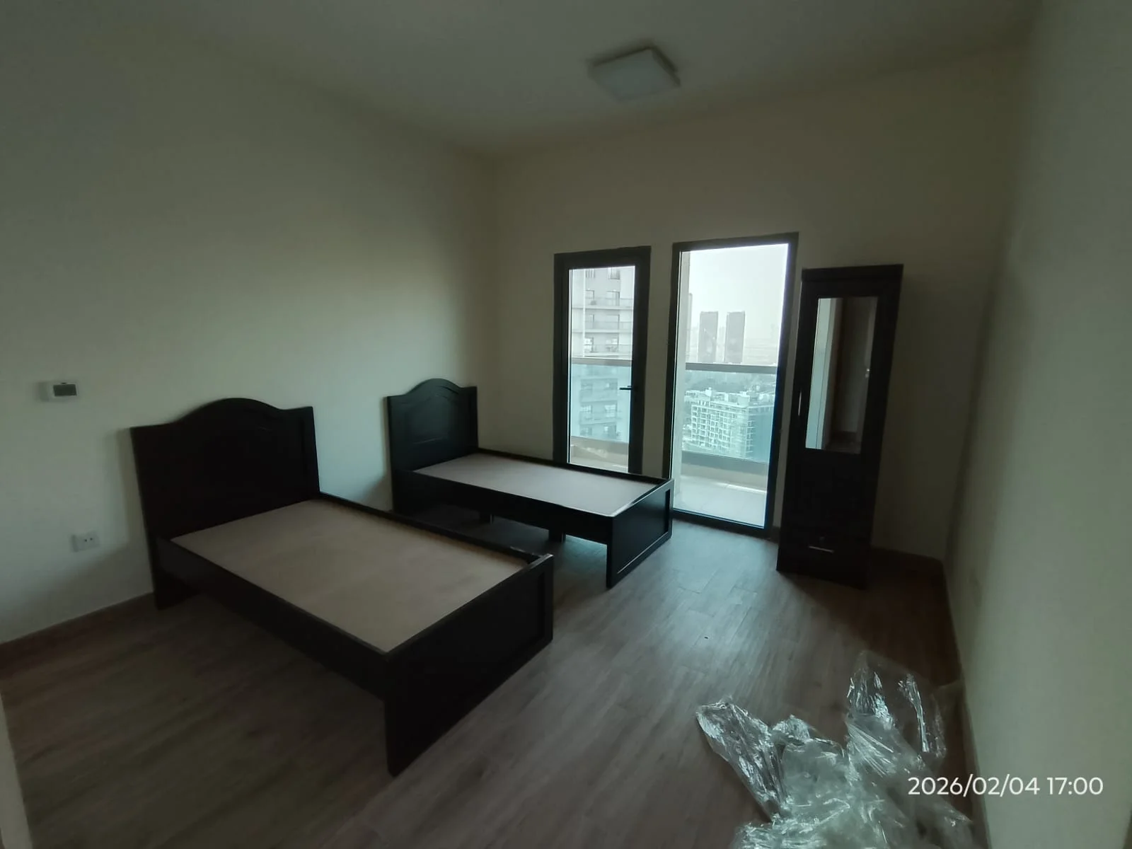 Technicians assembling furniture inside a Dubai home — supporting project view 2