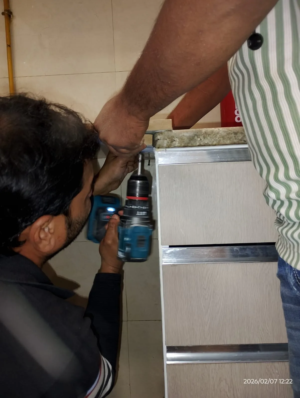 Technicians assembling furniture inside a Dubai home — supporting project view 3