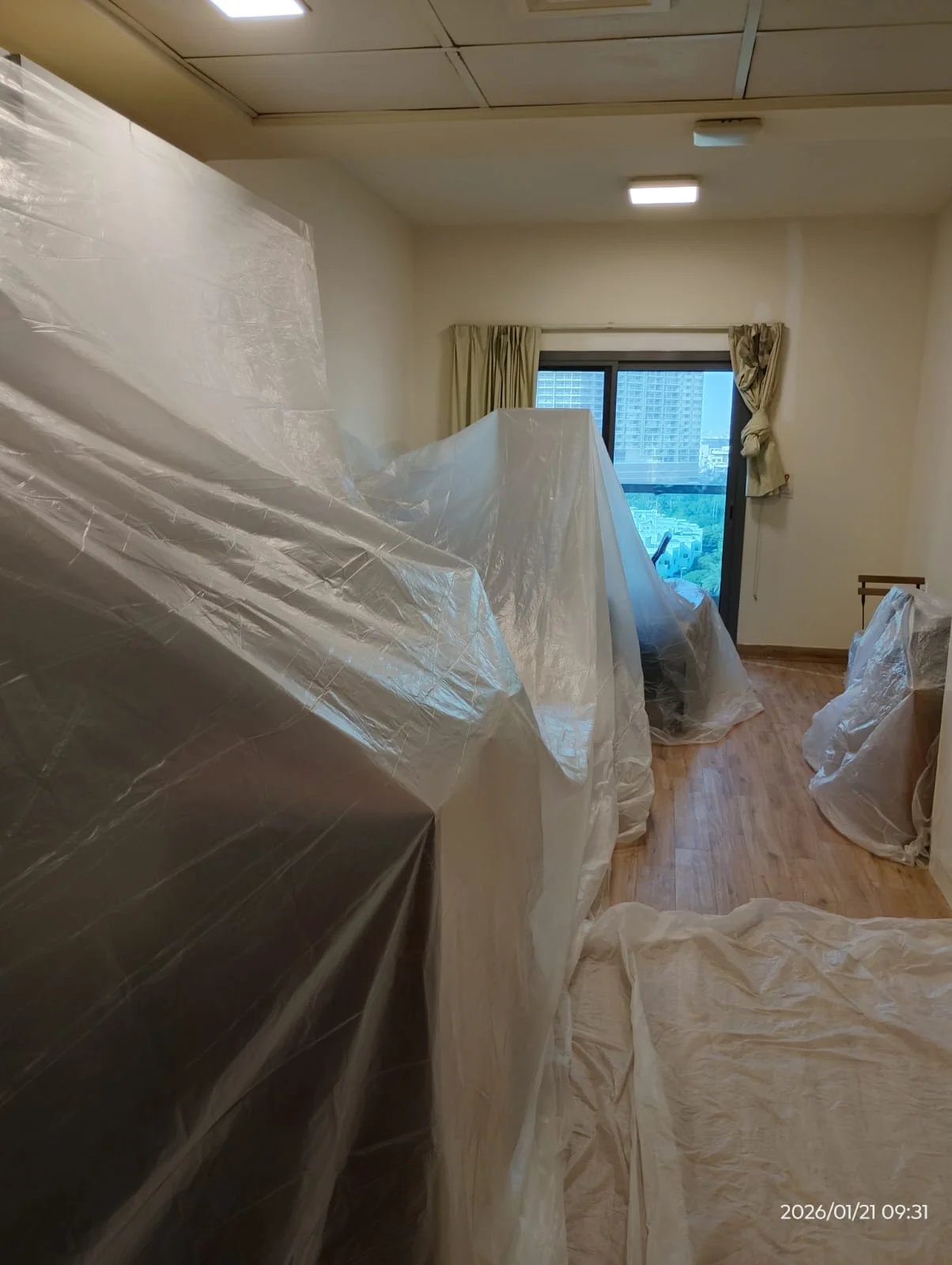 Painters applying wall paint inside a Dubai property — supporting project view 3