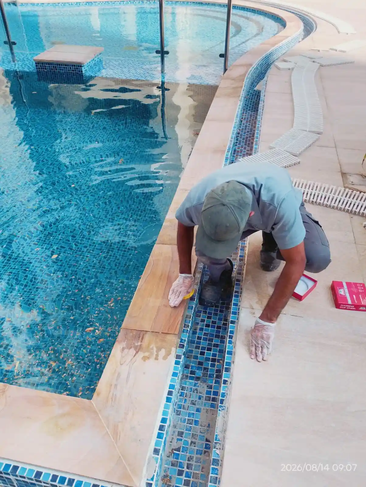 Technician carrying out pool maintenance at a Dubai property — supporting project view 2