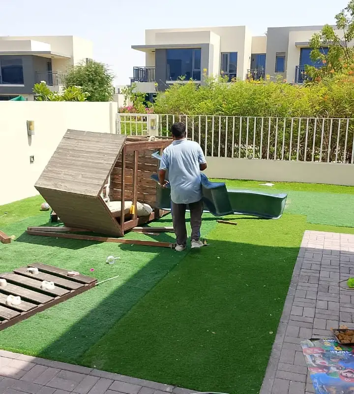 Technician carrying out maintenance at a Dubai villa